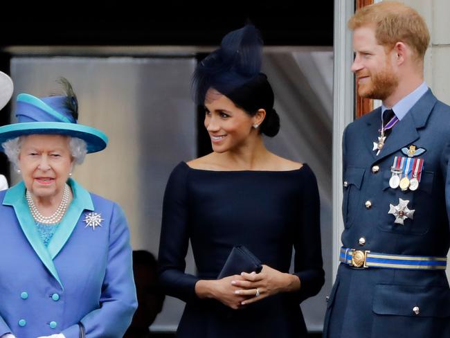 Britain’s Queen Elizabeth II, Meghan, Duchess and Prince Harry. Picture: Tolga Akmen