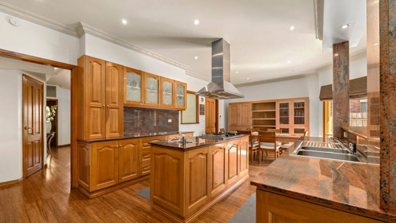 The expansive kitchen with plenty of storage.