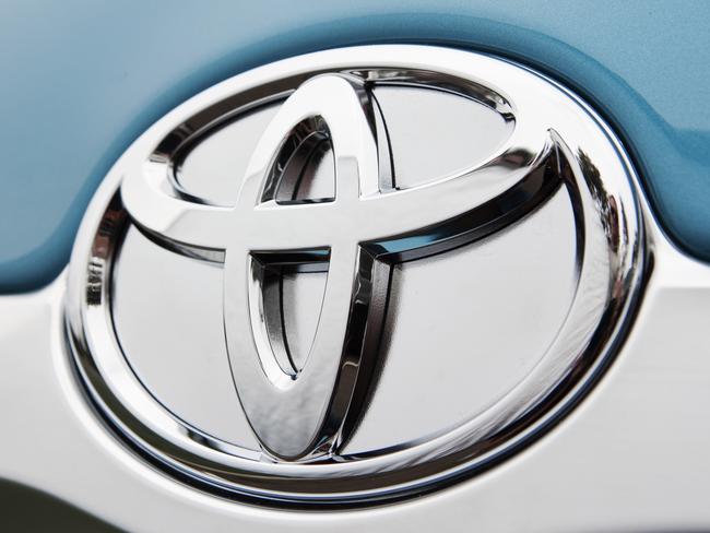 Badge on the 2010 Toyota Camry Hybrid Luxury sedan.