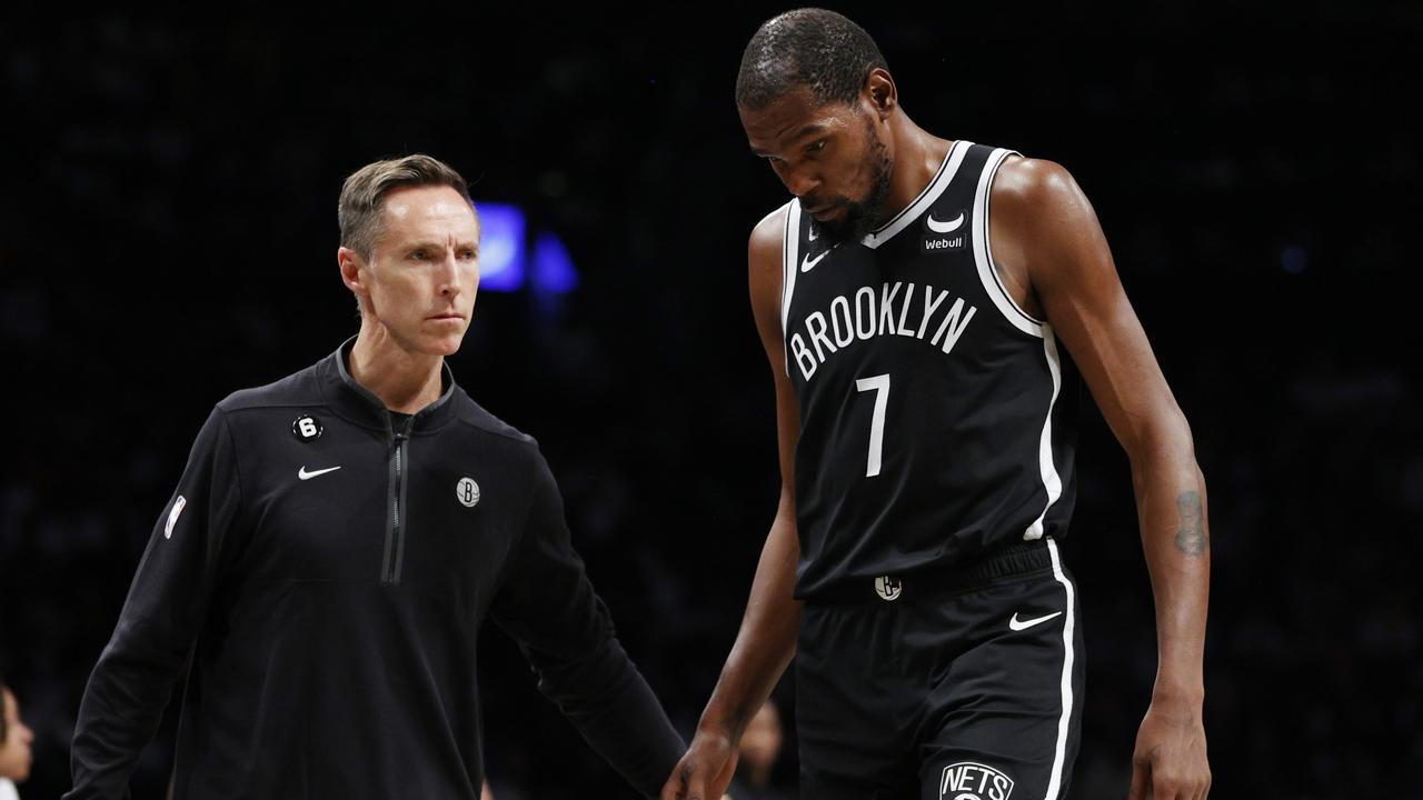NEW YORK, NEW YORK - OCTOBER 19: Head coach Steve Nash high-fives Kevin Durant #7 of the Brooklyn Nets as he heads to the bench during the second half against the New Orleans Pelicans at Barclays Center on October 19, 2022 in the Brooklyn borough of New York City. The Pelicans won 130-108. NOTE TO USER: User expressly acknowledges and agrees that, by downloading and or using this photograph, User is consenting to the terms and conditions of the Getty Images License Agreement. (Photo by Sarah Stier/Getty Images)