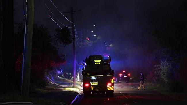 Fire crews at the scene of a house fire last night. Picture: Gordon McComiskie