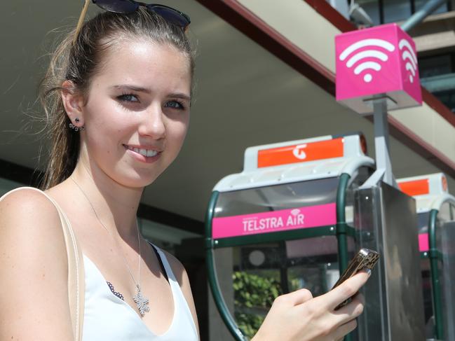 Telstra phones Tasmin Blarchford (Kelvin Grove) texting in Queen St Mall