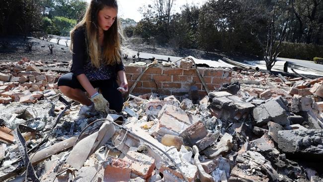 Tarnie Horner looks where her room was once searching for anything that she can salvage.