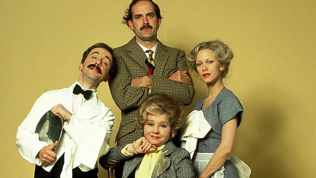 Basil Fawlty (John Cleese), Manuel (Andrew Sachs), Sybil Fawlty (Prunella Scales) and Polly (Connie Booth).