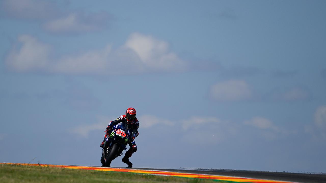 Yamaha French rider Fabio Quartararo rides his bike during the second MotoGP free practice session ahead of the Moto Grand Prix of Aragon at the Motorland circuit in Alcaniz on September 16, 2022. (Photo by PIERRE-PHILIPPE MARCOU / AFP)