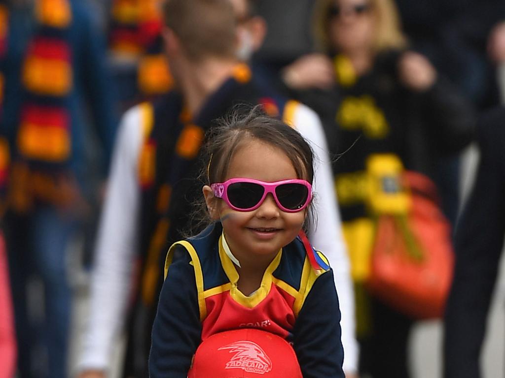 A young Crow fan arrives for the 2017 AFL Grand Final. Picture: Quinn Rooney/Getty Images