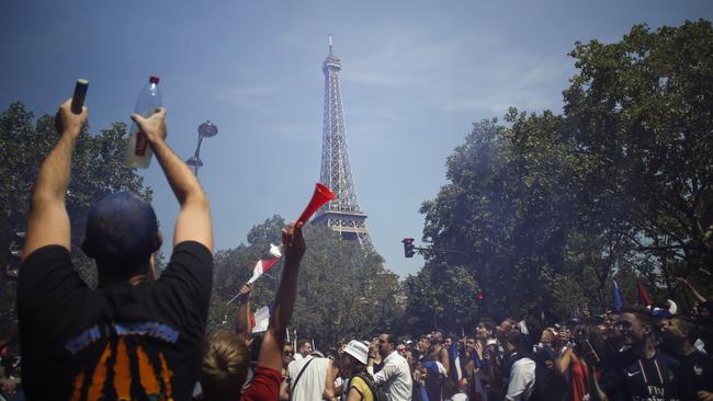 Supporters of France's national football team gather near the fan zone at the Champ de Mars, in front of the Eiffel Tower. Photo: AFP