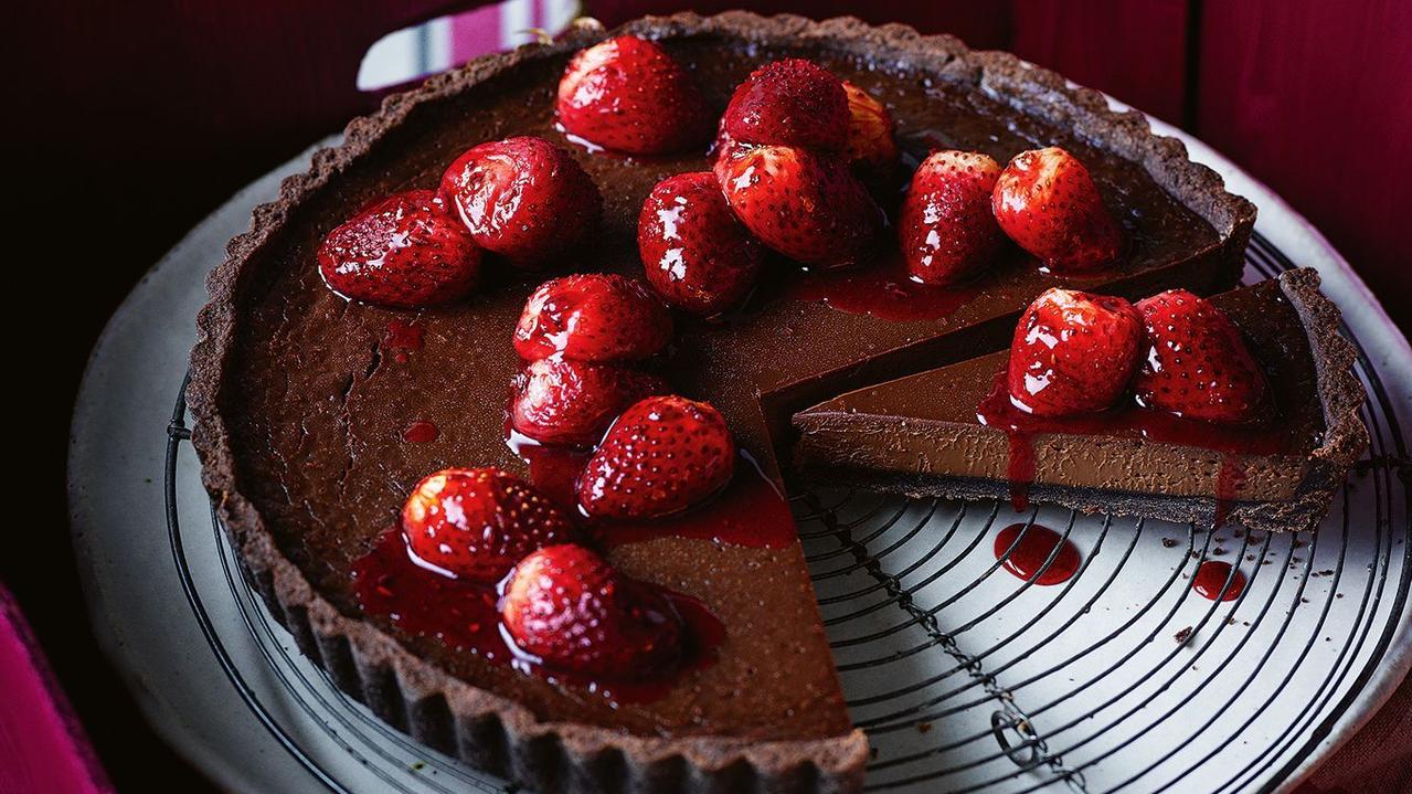 Chocolate ganache tart with strawberries.