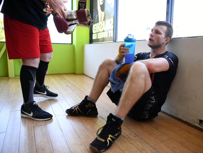 A weary Jeff Horn rests during training in Brisbane (AAP Image/Dan Peled)