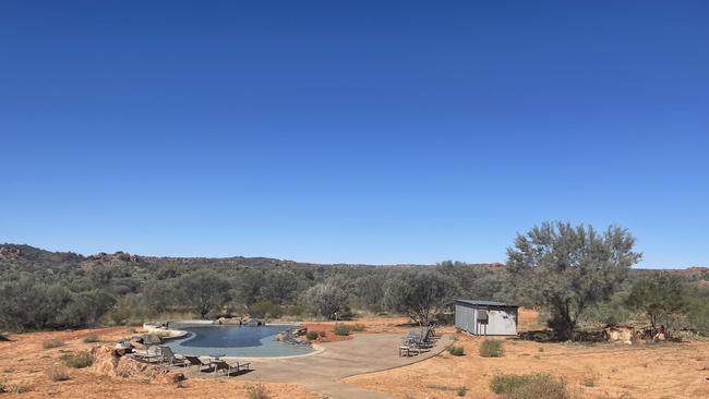 The Ooraminah Station Homestead pool, usually “filled with families” on a sunny day at this time of year, sits empty. The government has insisted there are “tourists everywhere” in Central Australia. Picture: Laura Hooper