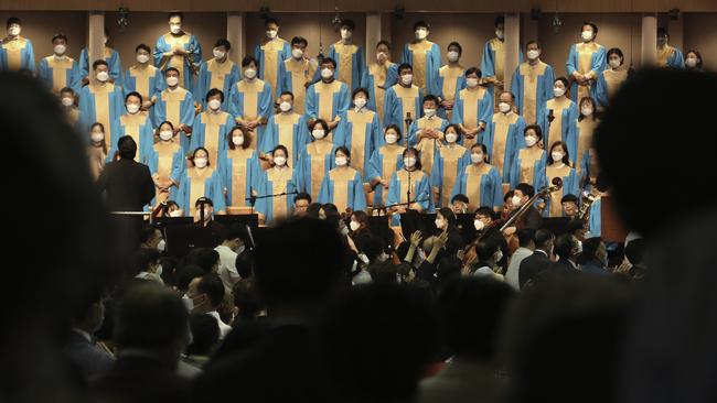 A choir wearing face masks at the Yoido Full Gospel Church in Seoul, South Korea, on Sunday. Picture: AP