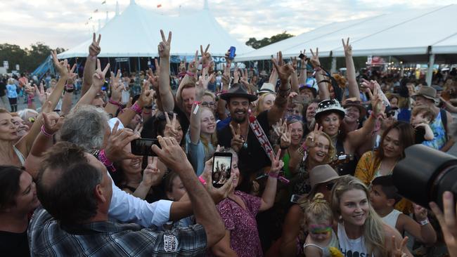 Michael Franti performs out in the general area with crowds at Bluesfest 2018 in Tyagarah near Byron Bay.