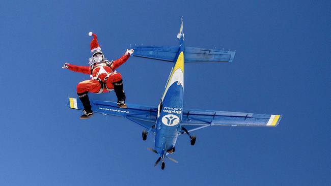 Santa and the Skydive Australia Great Ocean Road team take to the skies over Barwon Heads. Picture: Logan Morris