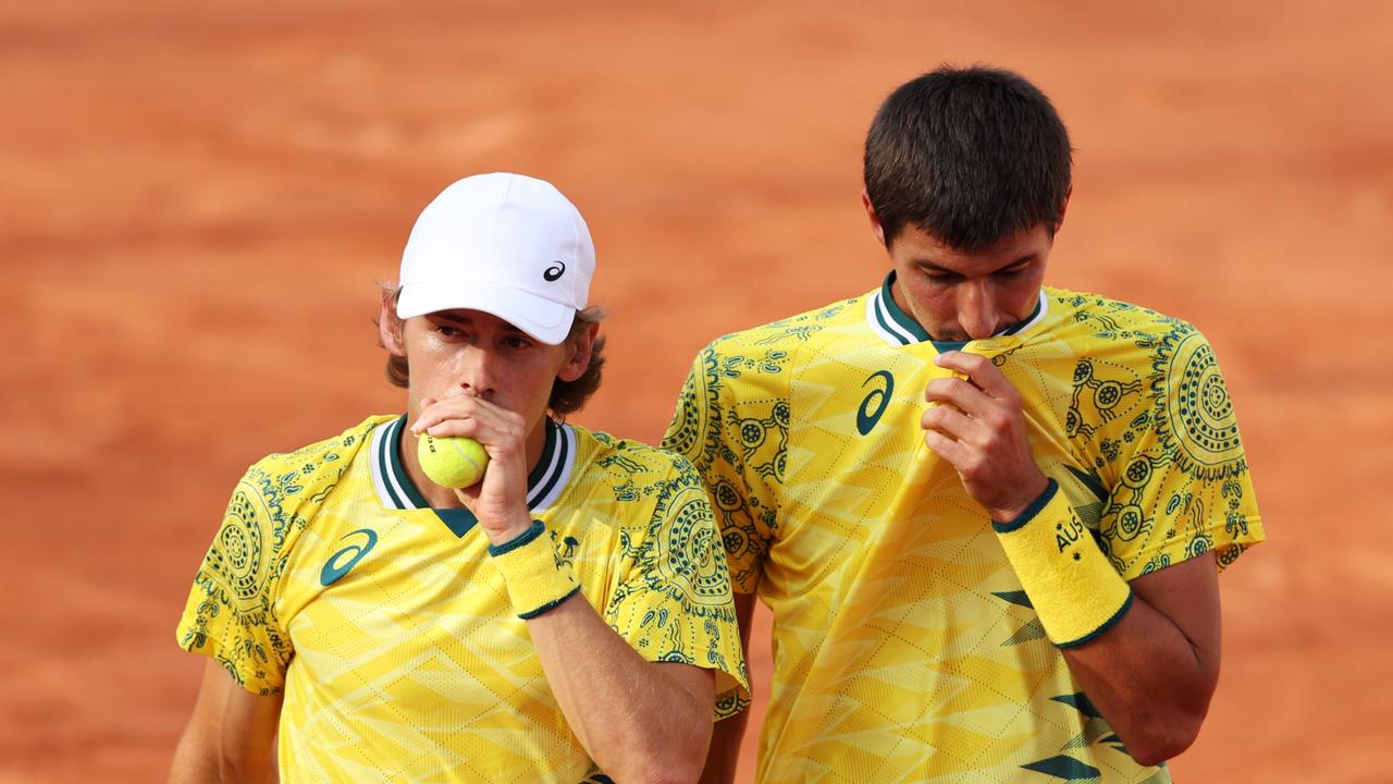 PARIS, FRANCE - JULY 29: Alexei Popyrin (R) and Alex de Minaur of Team Australia interact against Rajeev Ram and Augustin Krajicek of Team United States during the Men's Doubles first round match on day three of the Olympic Games Paris 2024 at Roland Garros on July 29, 2024 in Paris, France. (Photo by Clive Brunskill/Getty Images)