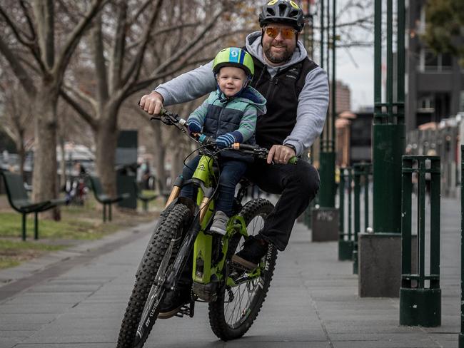 Karl Sapwood keeps active with son Ollie, 2, in Southbank. Picture: Jake Nowakowski