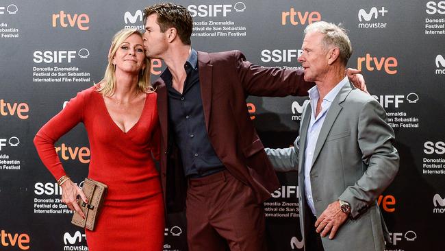 How sweet: Chris gave his mum a kiss on the red carpet. Picture: Carlos Alvarez/Getty Images