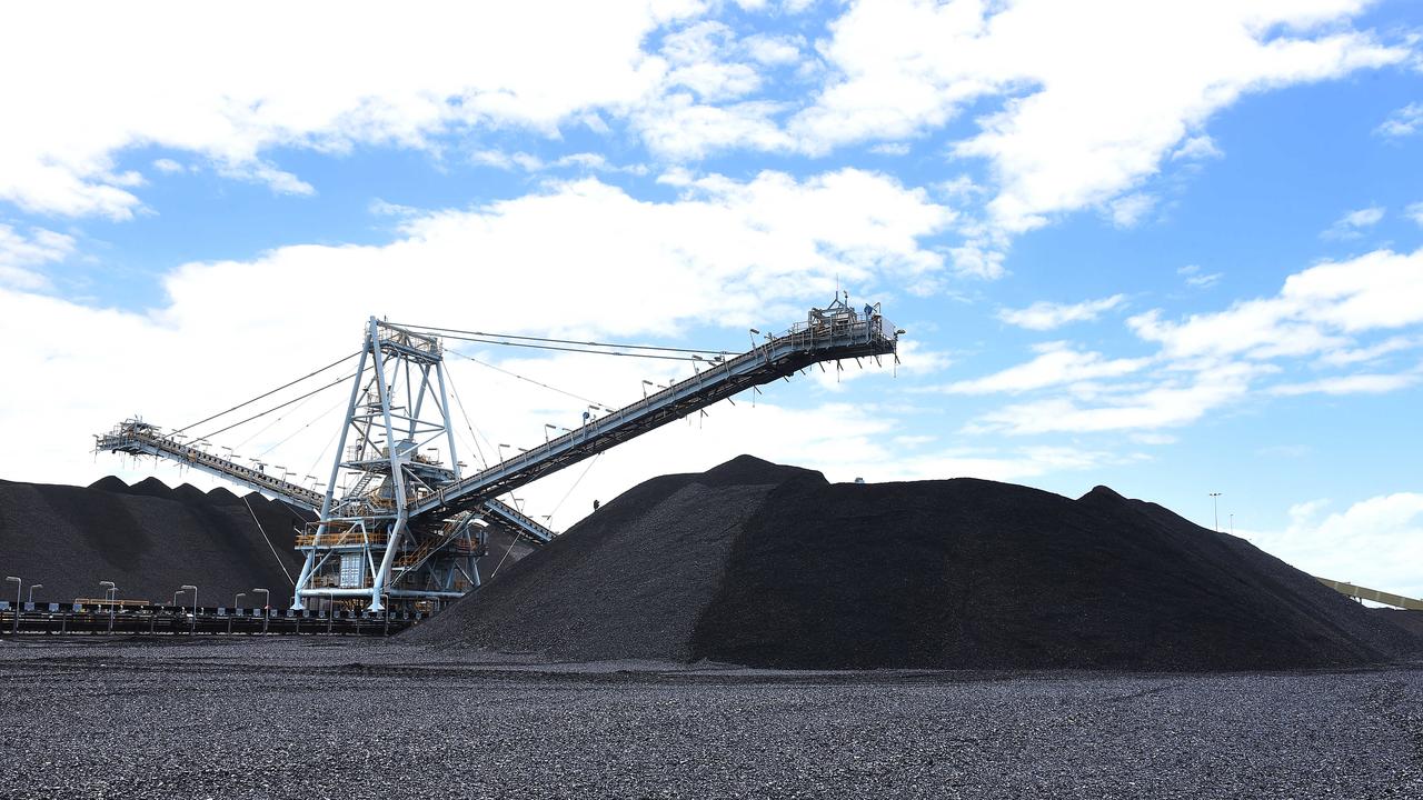 Coal at the Port of Brisbane. The value of coal production is expected to be halved by 2050. Picture: AAP image, John Gass