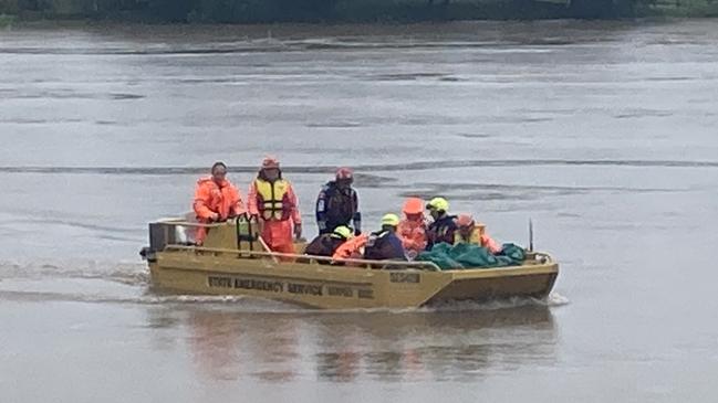 The dramatic rescue of a woman believed to be in her 80s, rescued form flood waters near Kempsey. Picture: Daniel Mills