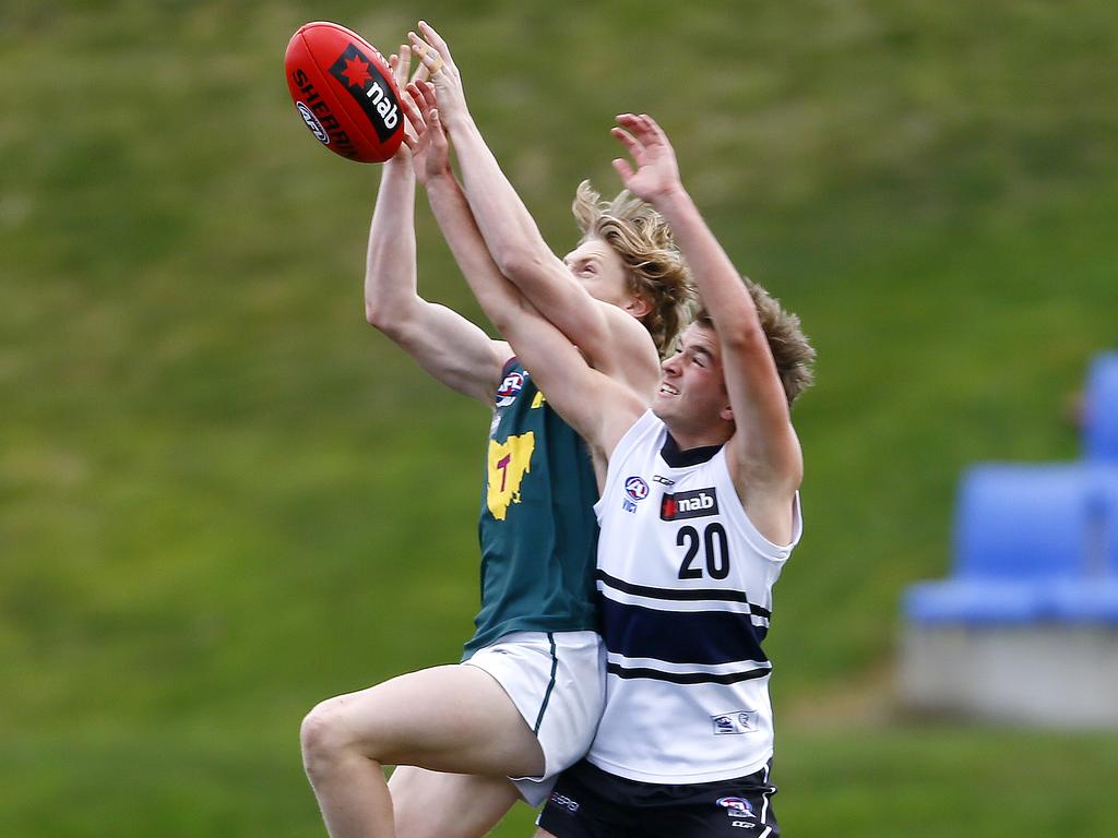 AFL - Tasmania Devils under-18 team in NAB League game against the Northern Knights at Twin Ovals, Kingston. (L-R) Isaac Chugg of The Devils flies high. Picture: MATT THOMPSON