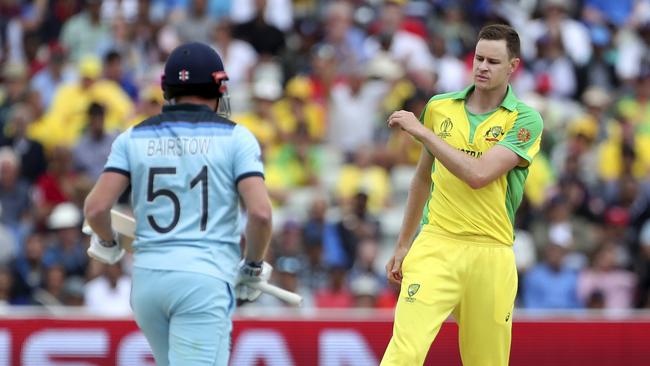 Not happy … Australian paceman Jason Behrendorff, right, reacts as England’s Jonny Bairstow runs between the wickets. Picture: AP