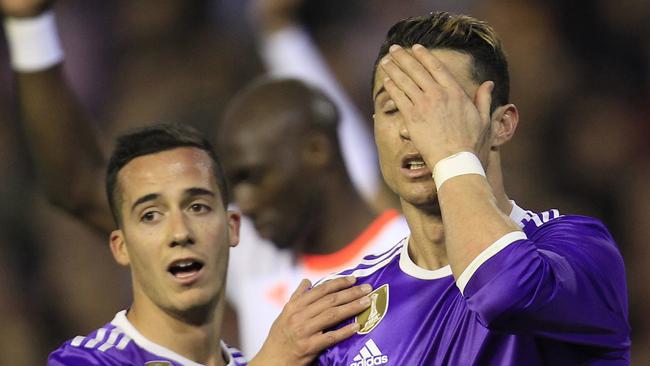 Real Madrid's Cristiano Ronaldo, right, and Real Madrid's Lucas Vazquez, left.