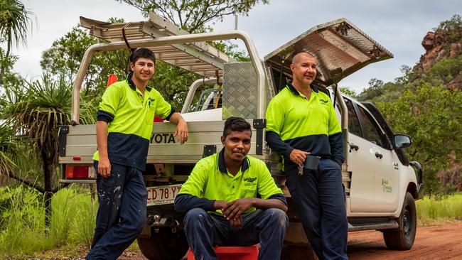 Kakadu Contracting boss Richard Mitchell, right, with apprentices Jason Cunningham, front, and Riley Christophersen near Jabiru. Picture: Amos Aikman