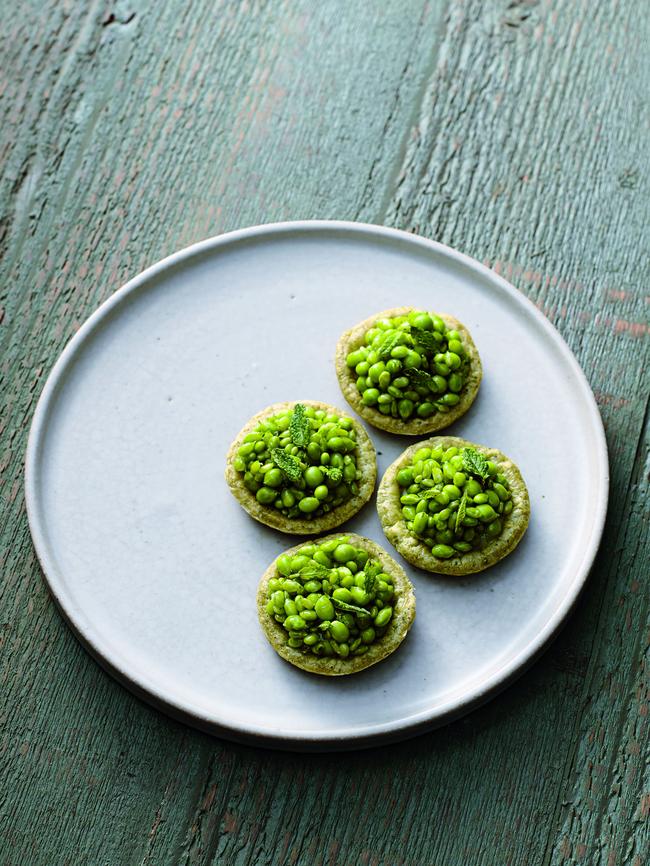 Raw pea and lemon aspen tart and sashimi-grade prawns with nasturtium and finger lime.