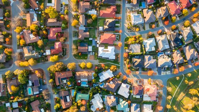 Typical Australian suburb from above in autumn; housing overhead generic