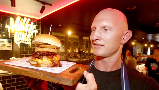 Milky Lane restaurant and Bar in Surfers Paradise — Scott Findlay Executive chef and Co owner with their June burger — the Peanut Butter and Jelly burger. Picture Mike Batterham