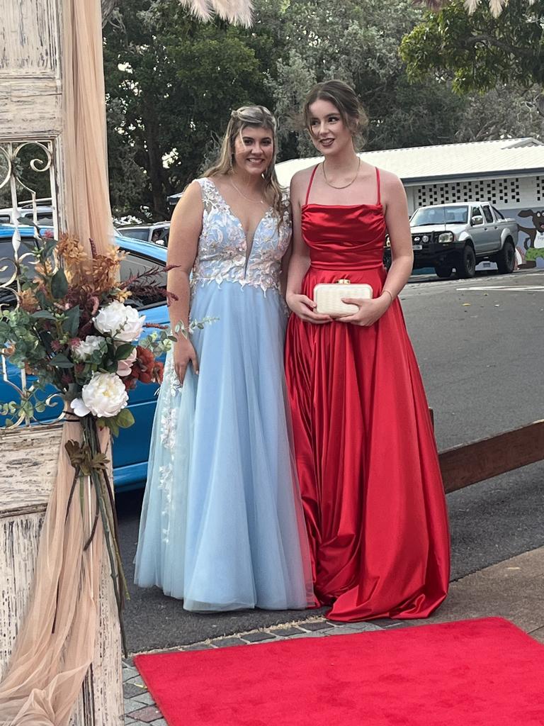 Imogen Peaker and Sophie Burraston arrive at the Hervey Bay High School formal.