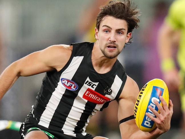 MELBOURNE, AUSTRALIA - JUNE 11: Josh Daicos of the Magpies in action during the 2020 AFL Round 02 match between the Collingwood Magpies and the Richmond Tigers at the Melbourne Cricket Ground on June 11, 2020 in Melbourne, Australia. (Photo by Michael Willson/AFL Photos via Getty Images)