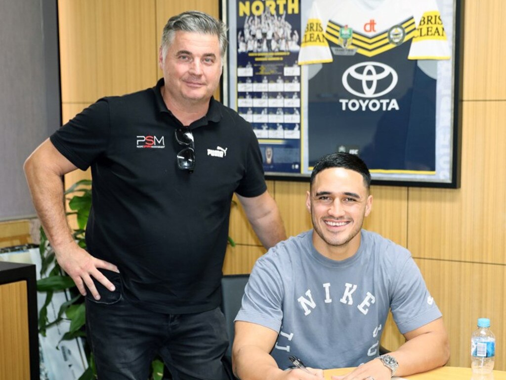 Taumalolo’s agent Chris Orr, pictured alongside Valentine Holmes. Picture: NQ Cowboys