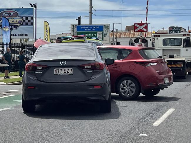 Police are directing traffic near a busy Bundaberg intersection after a two-vehicle crash on Thursday morning.