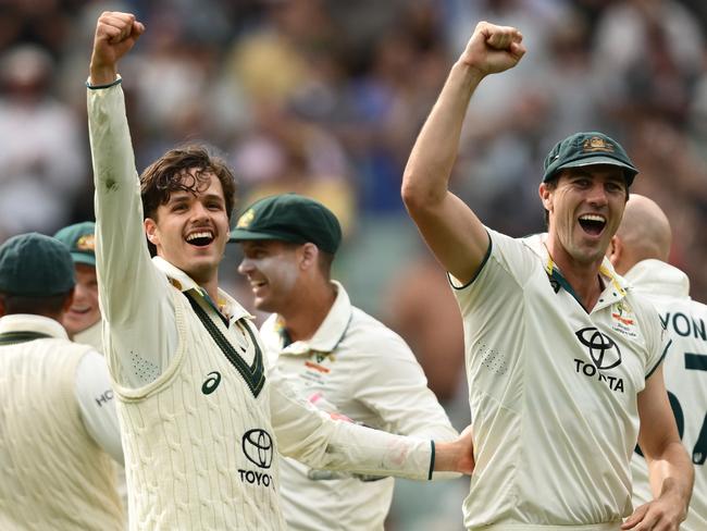 MELBOURNE, AUSTRALIA - DECEMBER 30: Sam Konstas of Australia and Pat Cummins of Australia celebrates victory during day five of the Men's Fourth Test Match in the series between Australia and India at Melbourne Cricket Ground on December 30, 2024 in Melbourne, Australia. (Photo by Quinn Rooney/Getty Images)