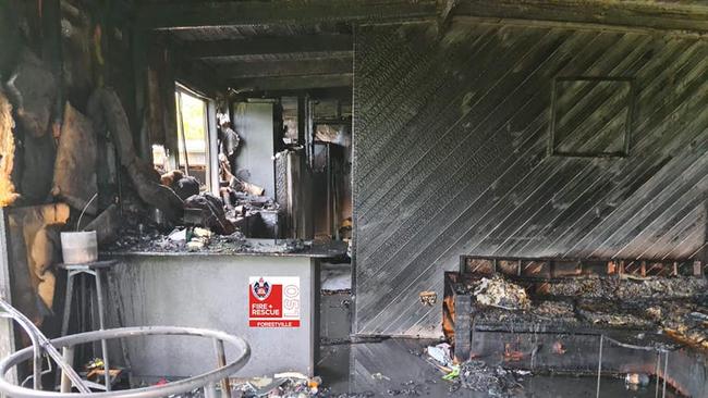 The badly damaged kitchen and living area. Picture: NSW Fire and Rescue (Forestville)