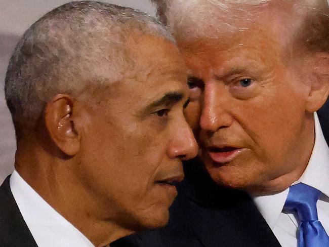 WASHINGTON, DC - JANUARY 09: Former U.S. President Barack Obama (L) and U.S. President-elect Donald Trump visit while attending the state funeral for former U.S. President Jimmy Carter with former first lady Melania Trump, Vice President Kamala Harris and second gentleman Doug Emhoff at Washington National Cathedral on January 09, 2025 in Washington, DC. President Joe Biden declared today a national day of mourning for Carter, the 39th President of the United States, who died at the age of 100 on December 29, 2024 at his home in Plains, Georgia.   Chip Somodevilla/Getty Images/AFP (Photo by CHIP SOMODEVILLA / GETTY IMAGES NORTH AMERICA / Getty Images via AFP)