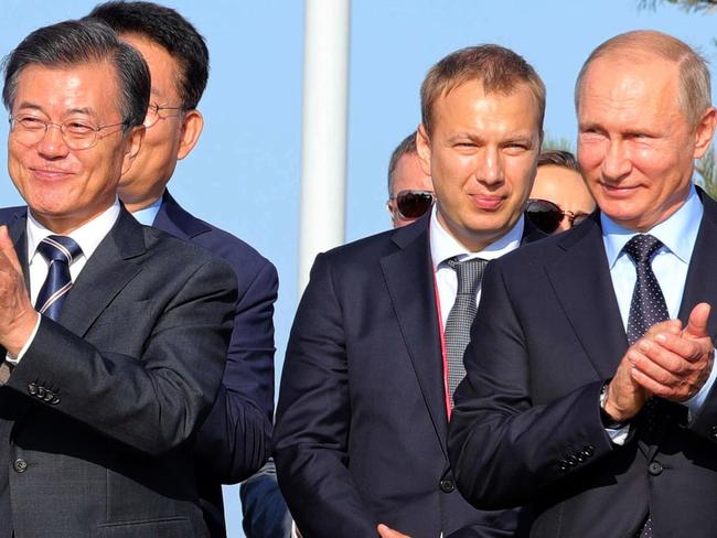 South Korean President Moon Jae-in and Vladimir Putin following a meeting outside Vladivostok yesterday. Picture: Sputnik/Michael Klimentyev/AFP