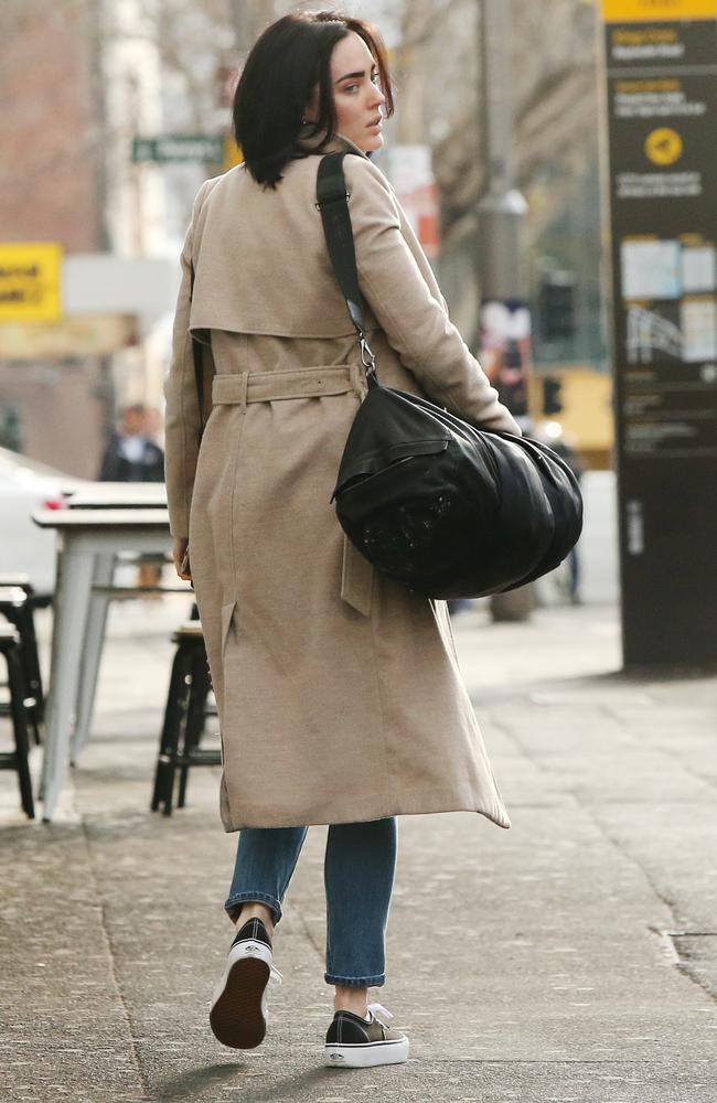 Sarah Budge leaves Crane Bar after a meeting with John Ibrahim and another man last week. Picture: Richard Dobson