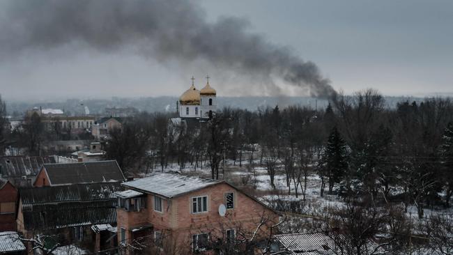 (FILES) Black smoke rises after shelling in Bakhmut in February. Picture: Yasuyoshi Chiba / AFP