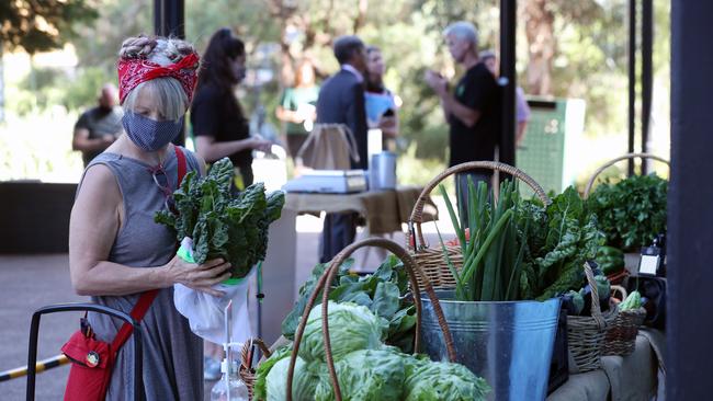 Some Melburnians are choosing to wear masks outdoors. Picture: David Crosling/NCA NewsWire.