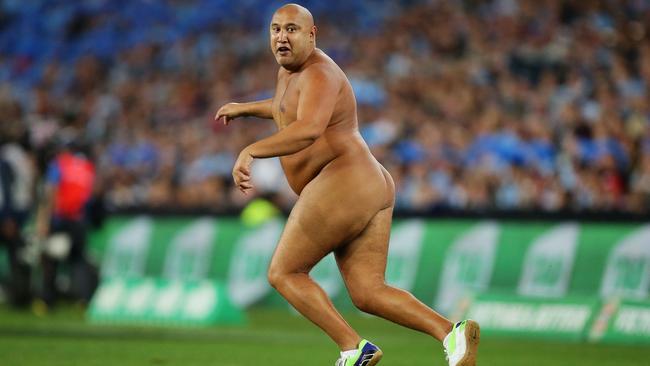 A streaker runs onto the field in the final minutes during game three of the ARL State of Origin series between the New South Wales Blues and the Queensland Maroons at ANZ Stadium on July 17, 2013 in Sydney, Australia. (Photo by Matt King/Getty Images)