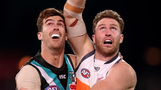 ADELAIDE, AUSTRALIA – JULY 27: Dawson Simpson of the Giants competes with Scott Lycett of the Power during the 2019 AFL round 19 match between the Port Adelaide Power and the GWS Giants at Adelaide Oval on July 27, 2019 in Adelaide, Australia. (Photo by James Elsby/AFL Photos via Getty Images)