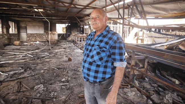 Kevin Davies in the old Mintabie Hotel, which has been destroyed by fire. Picture Simon Cross