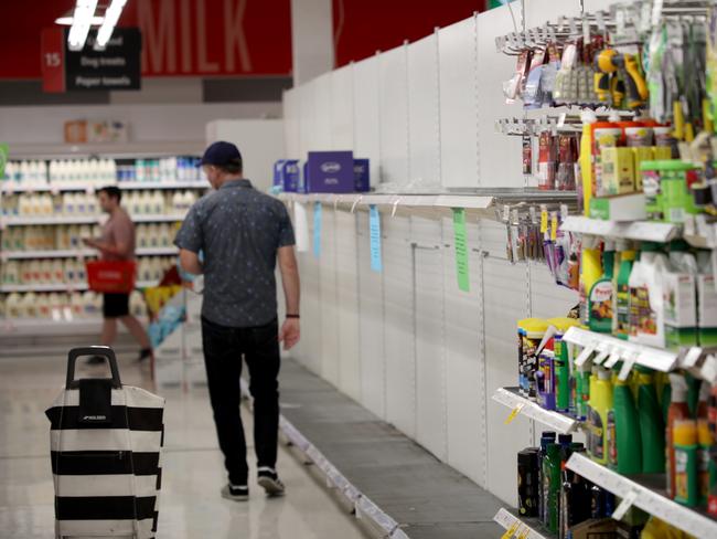 Empty toilet paper shelves at Coles supermarket in Adelaide, Friday, March 13, 2020.  (AAP Image/Kelly Barnes) NO ARCHIVING