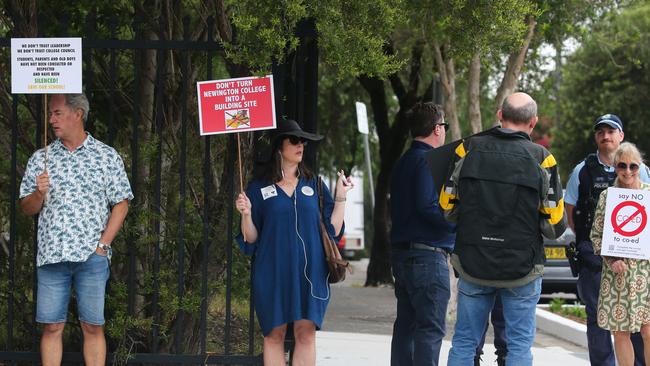 Parents are seen campaigning against Newington College's controversial decision to go co-ed at the prestigious secondary school on the first day of the 2024 academic year today in Stanmore, Sydney. Picture: Gaye Gerard