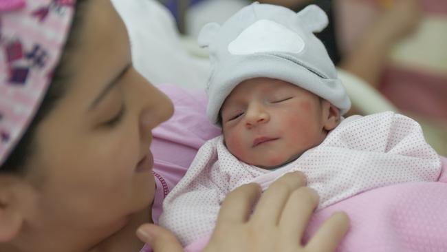 Generic photo of a mother and baby in hospital.  A newborn baby enters the world and mother holding newborn baby girl in the hospital.    Picture: iStock