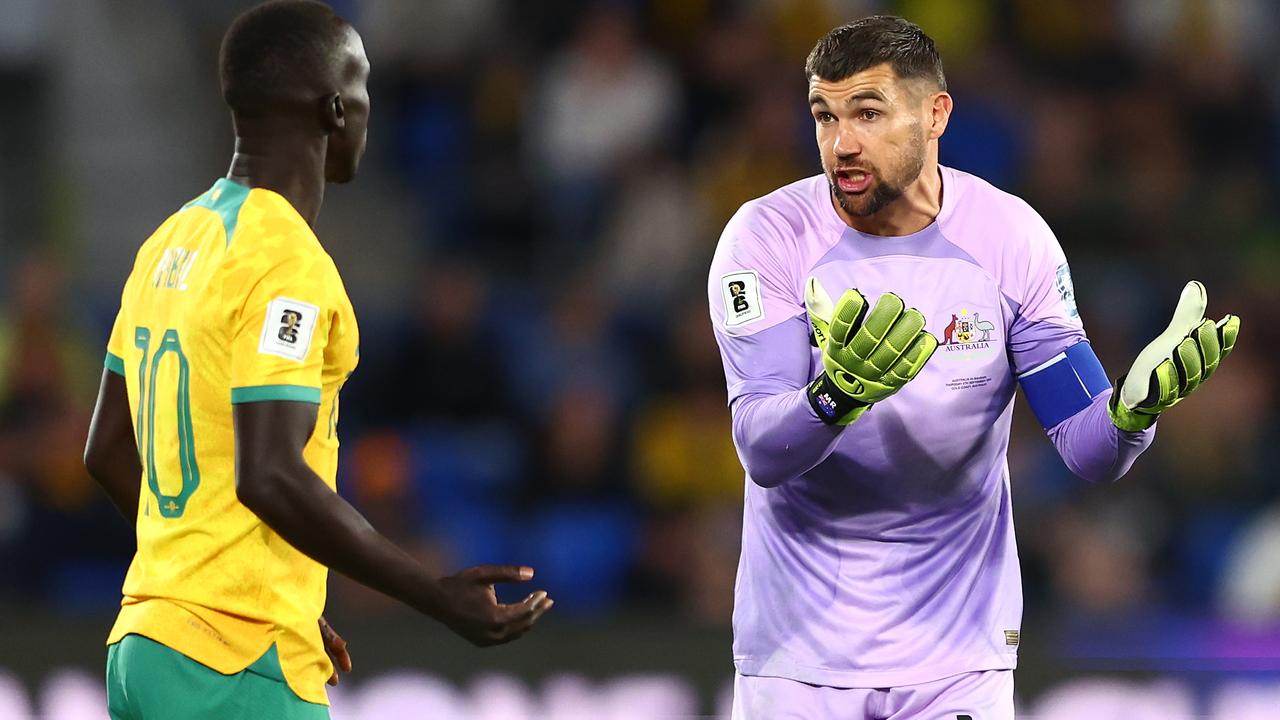 GOLD COAST, AUSTRALIA - SEPTEMBER 05: Mathew Ryan of Australia talks to a10during the round three 2026 FIFA World Cup AFC Asian Qualifier match between Australia Socceroos and Bahrain at Robina Stadium on September 05, 2024 in Gold Coast, Australia. (Photo by Chris Hyde/Getty Images)