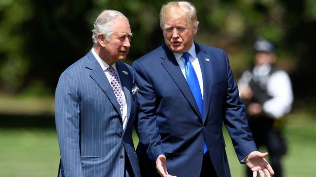 Donald Trump is greeted by Prince Charles on his arrival at Buckingham Palace on Marine One in June. Picture: Getty Images.