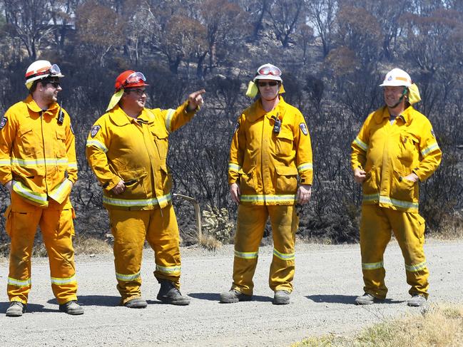 Firefighters Joe Cooper, left, Matthew Butler, Simon Street and Tony Baillie at Miena. Picture: MATT THOMPSON