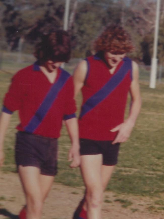 Brain playing footy in Mandurah.